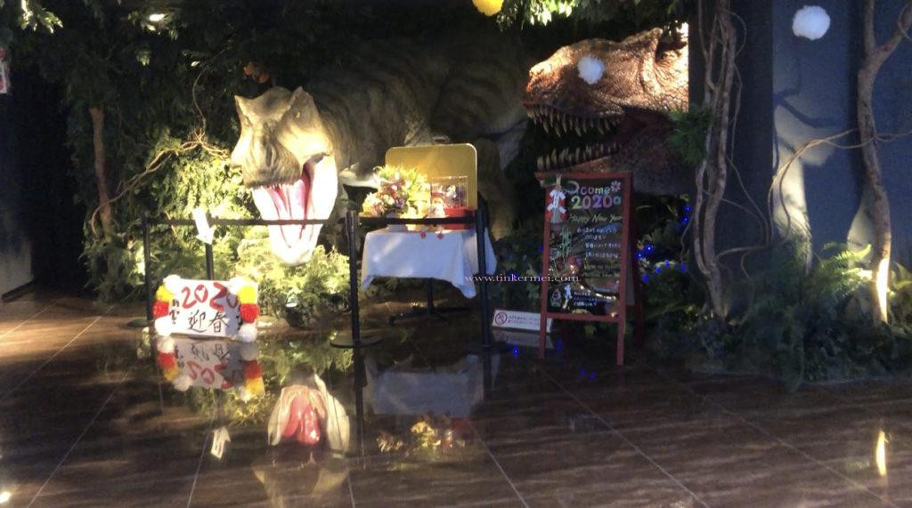 2 dinosaur robots in the hotel lobby