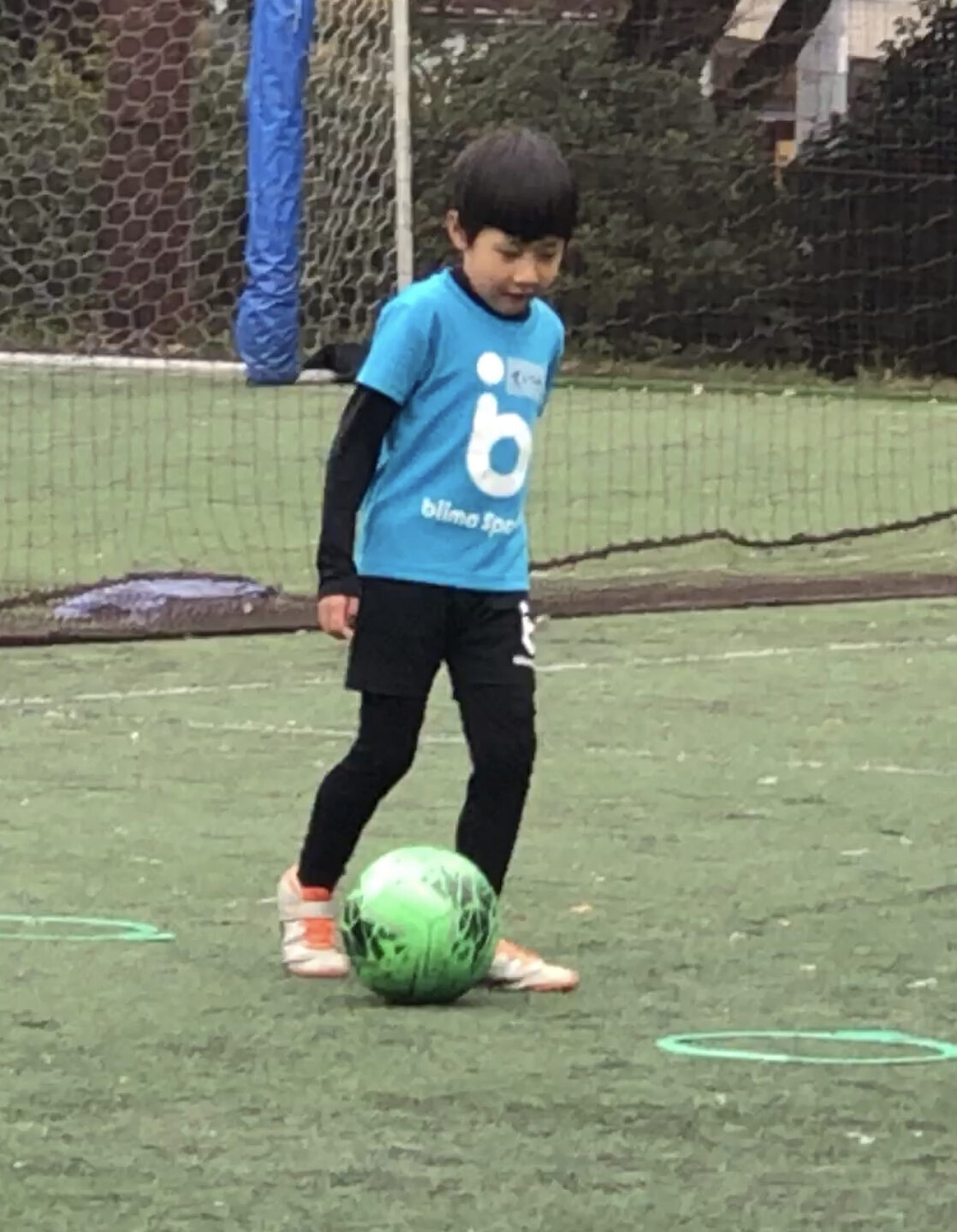 A boy playing soccer