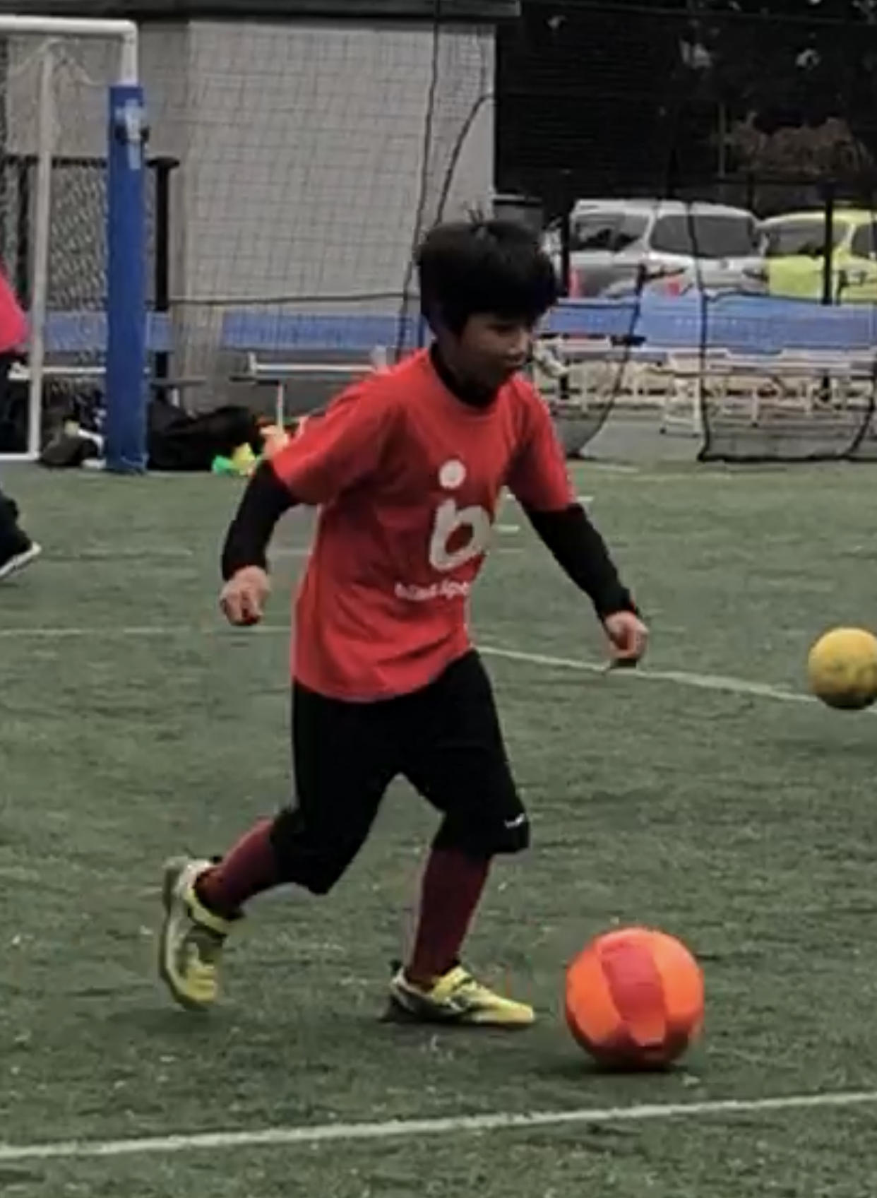 A boy playing soccer