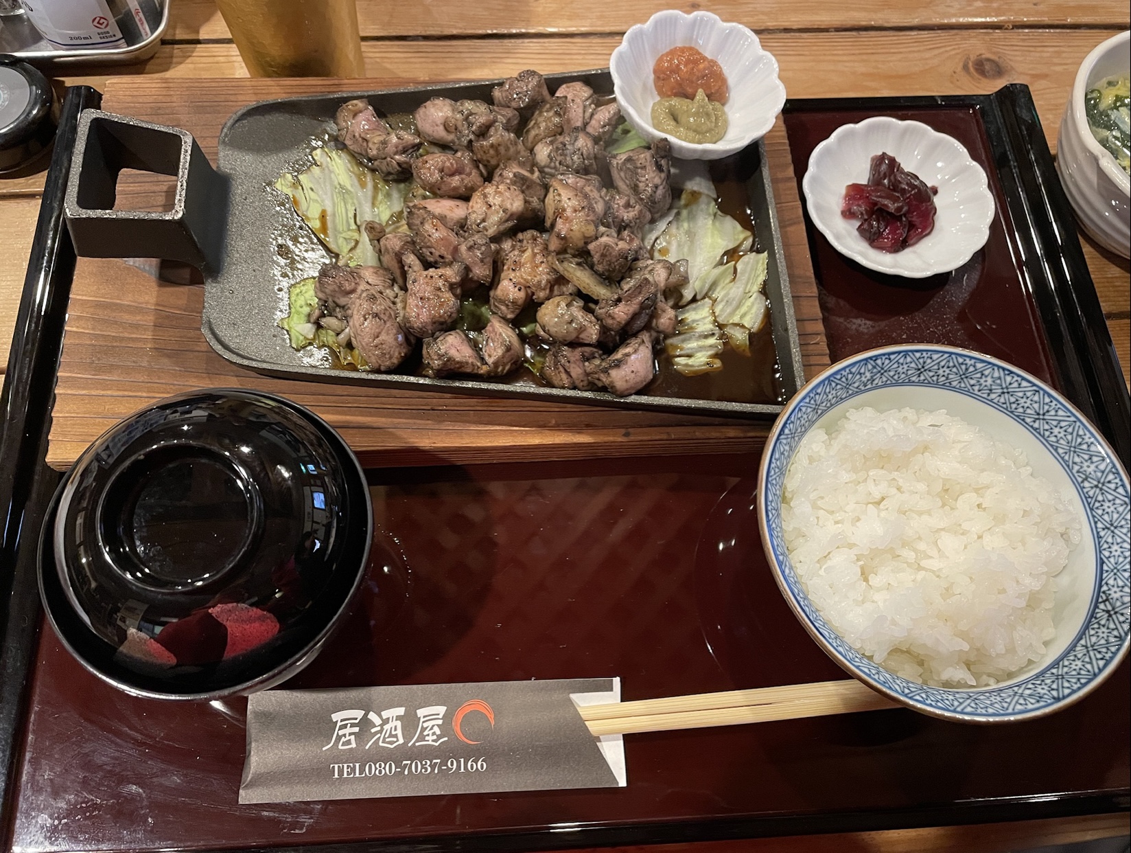 Set of meal. Chicken and cabbage on hot plate.