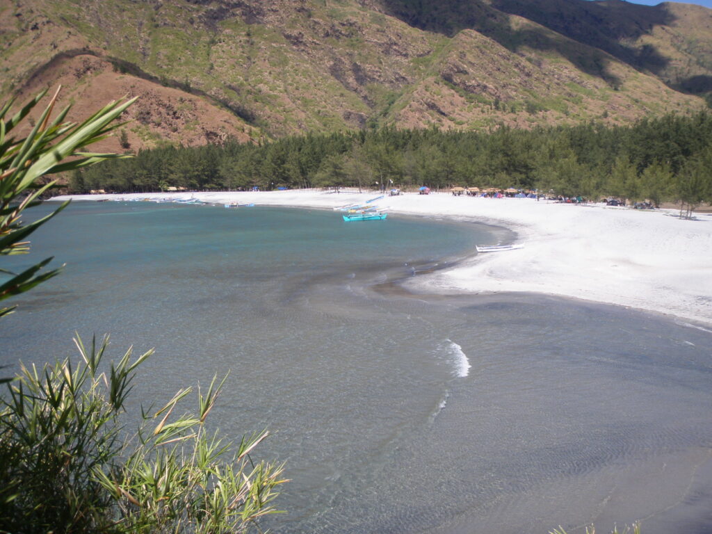View of a beach and white sand form top view mountain.